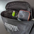 Decay Bauchtasche für Raver in schwarz, geöffnet mit Inhalt